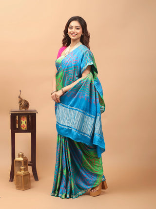 Neelambari – Azure Blue and Fresh Leaf Green Pure Gajji Silk Saree with Hand Rai Bandhej