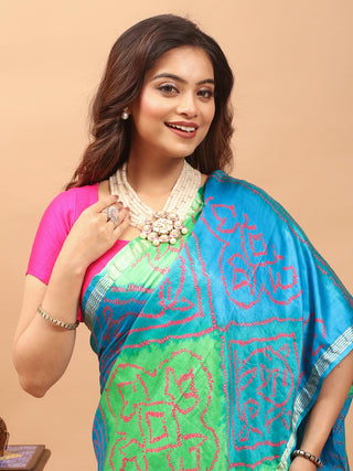 Neelambari – Azure Blue and Fresh Leaf Green Pure Gajji Silk Saree with Hand Rai Bandhej