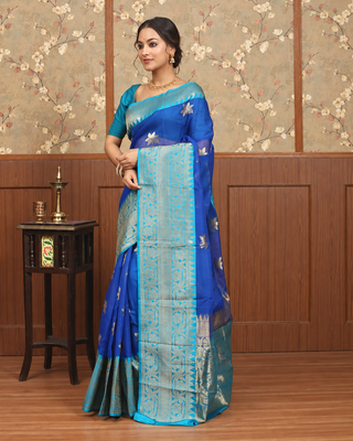 Royal Blue Pure Kora Banarasi Handloom Silk Saree with Silver Zari Floral Motifs and Turquoise Border