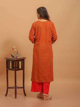 Rust Red Cambric Cotton Kurti with Banarasi Yoke Accented By Embroidery