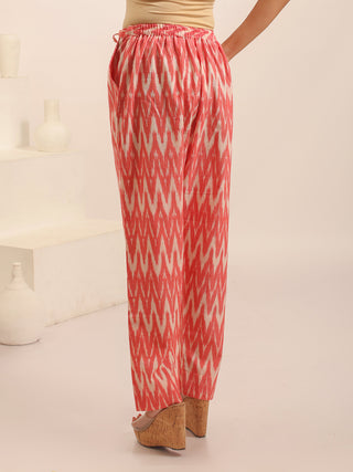 Carrot Colour Relaxed Fit Pure Ikkat Cotton Pants With Geometric Pattern