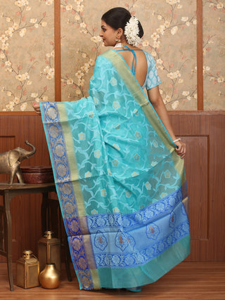 Sky Blue Mercerised Cotton Banarasi With Floral Border And Jaal