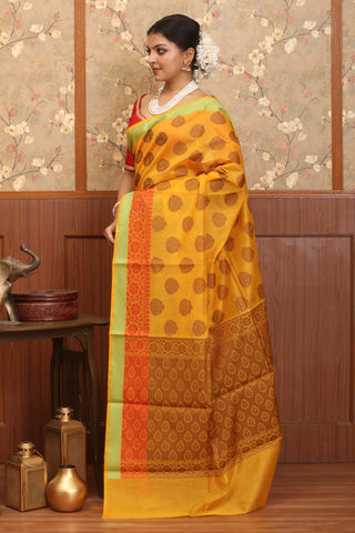 Yellow Mercerised Cotton Banarasi With Traditional Border And Butis