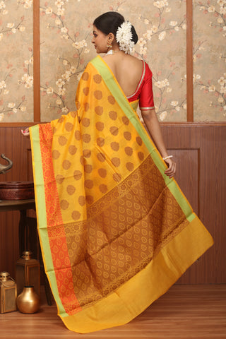 Yellow Mercerised Cotton Banarasi With Traditional Border And Butis