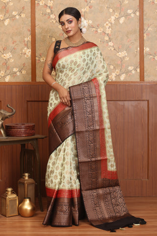 Cream Semi Georgette Banaras Saree With Brown And Red Traditional Border And Butis