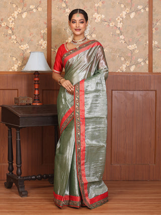 Pastel Green Tissue Silk Saree with Green Hand Aari Border And Red Brocade Finishing