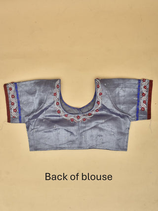 Royal Blue Tissue Silk Saree with Hand Aari Work and Red and Silver Detailing