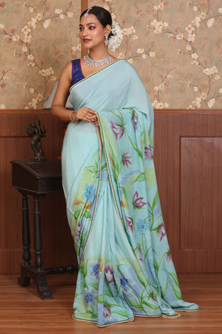 Aqua Crepe Silk Saree with Hand Painting and Aari Embellishments