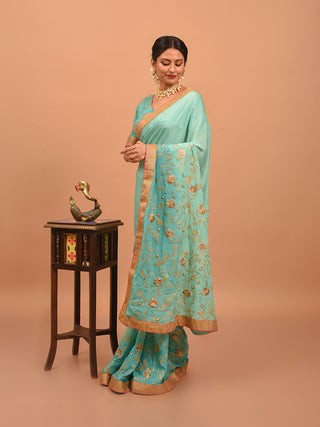 Aqua Blue Chinnon Silk Saree with Intricate Embroidery & Antique Gold Border