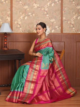 Teal Pure Silk Gadwal Saree With Magenta Border